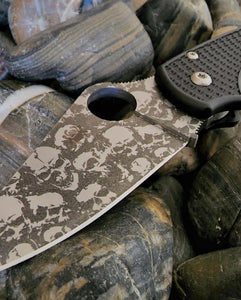Stainless Knife engraving with black skulls